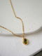 Olivine Bead/ Titanium Necklace