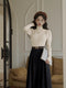 Puffy Sleeve Mock Neck Top + Pleated Skirt