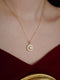 Shell Encircled Pearl Pendant Necklace